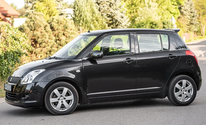 Suzuki Swift cena 18900 przebieg: 174000, rok produkcji 2009 z Ozimek małe 352